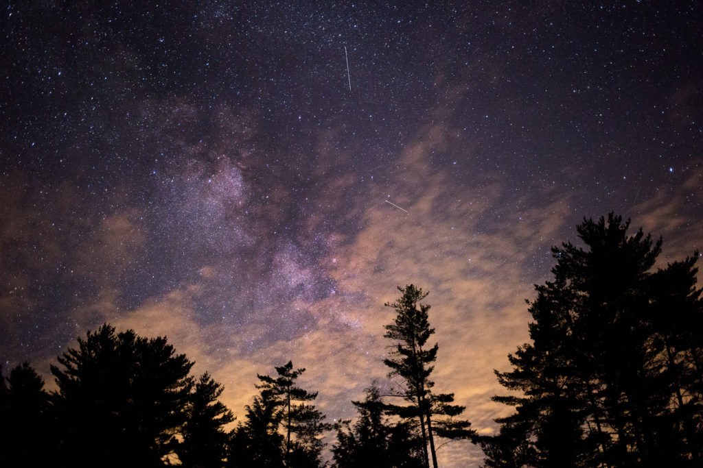 Milky Way Peeking Behind Warm Clouds