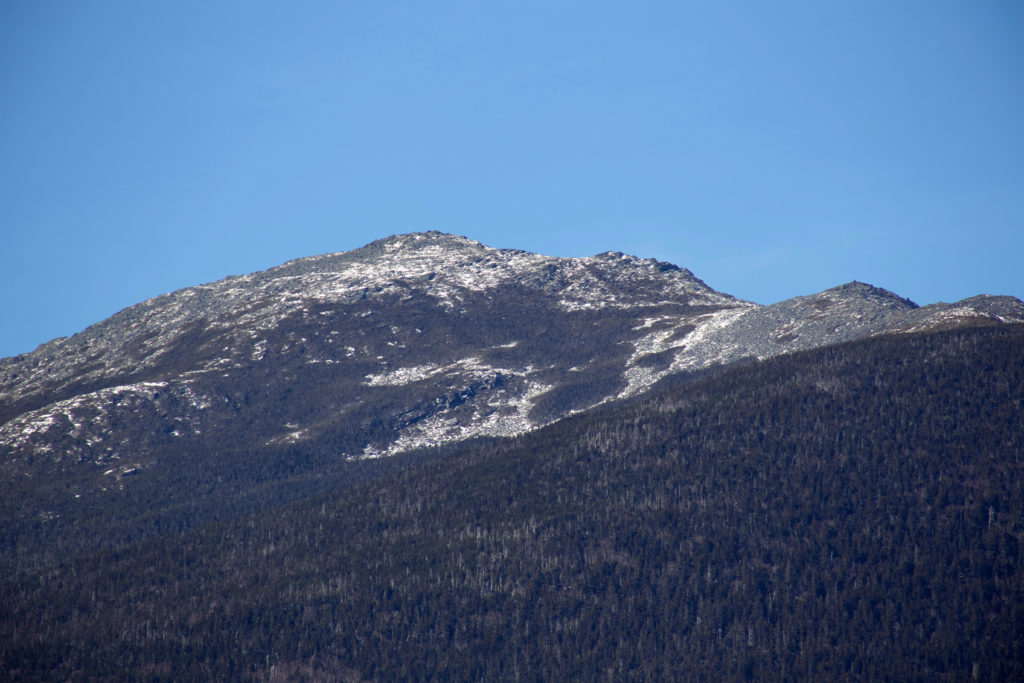 Snow Fallen Across Mountain Range