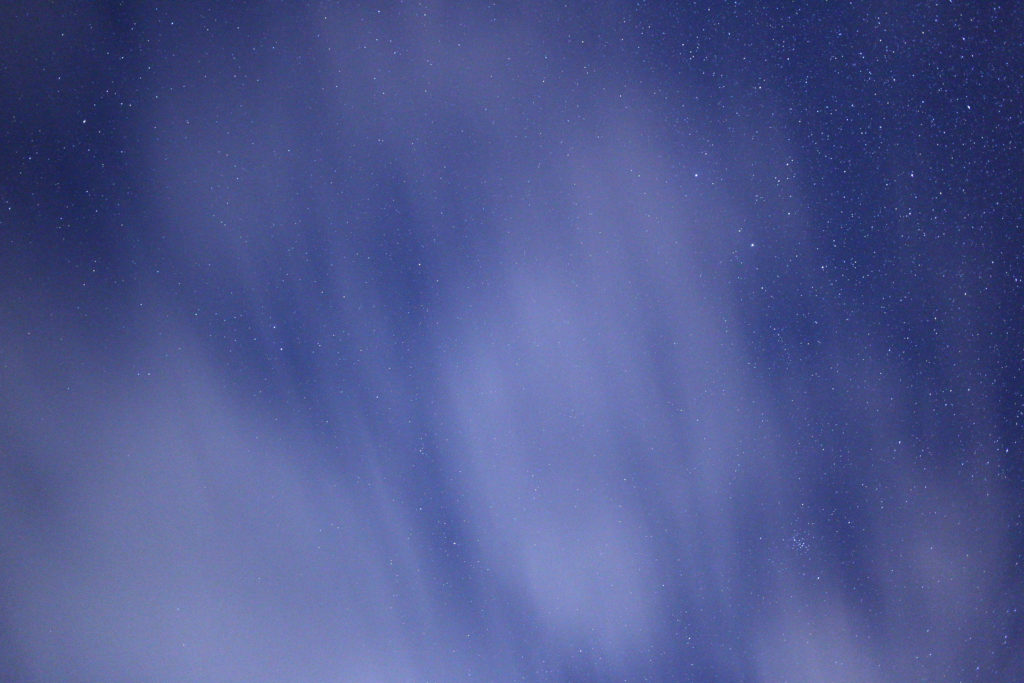 Stars Through Streaking Clouds