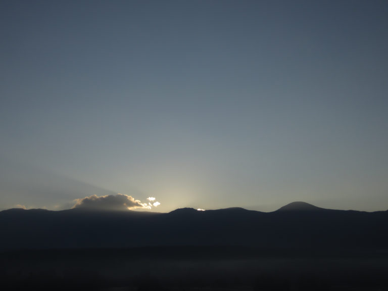 Sunlight Shining Over Mountaintops