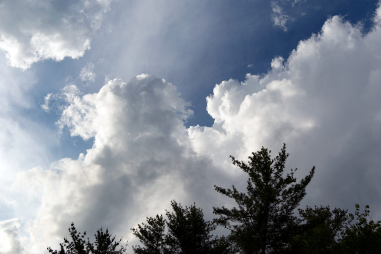 Puffy Clouds Rolling Through