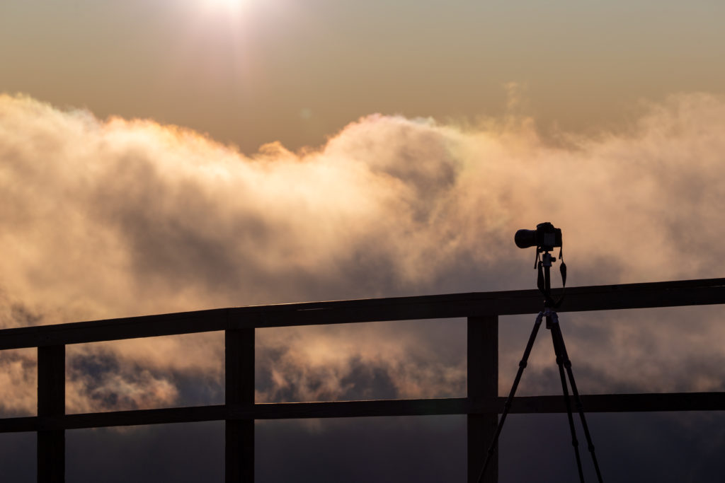 Photographer Capturing the Sunrise