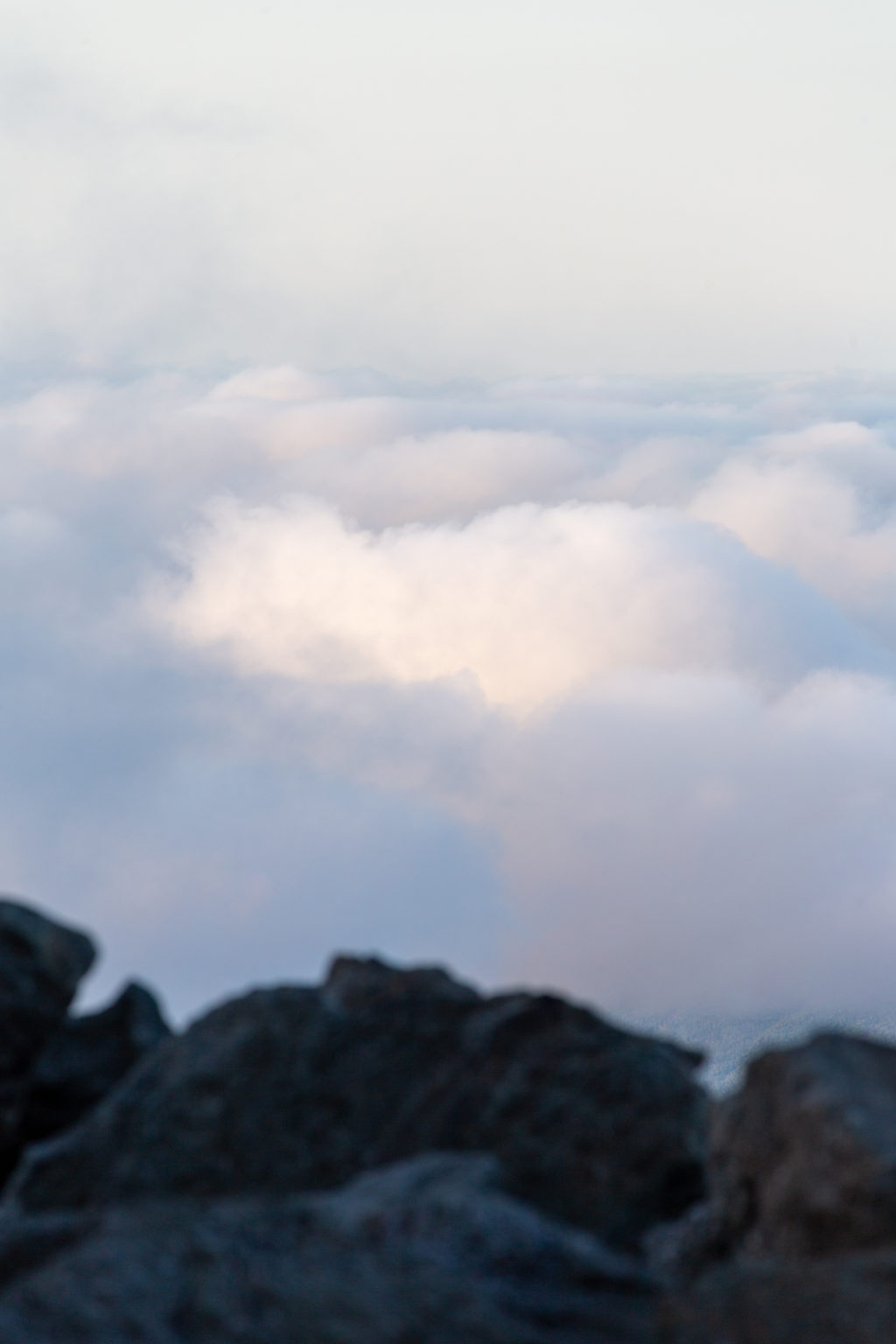 Rocky Summit Overlooking Clouds