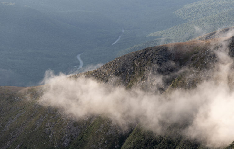 Fog and Mountains Above a Road