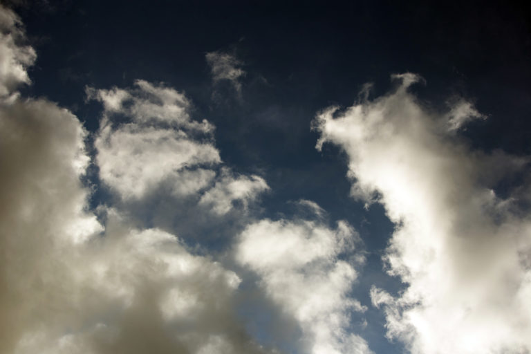 Bright Clouds on Dark Sky