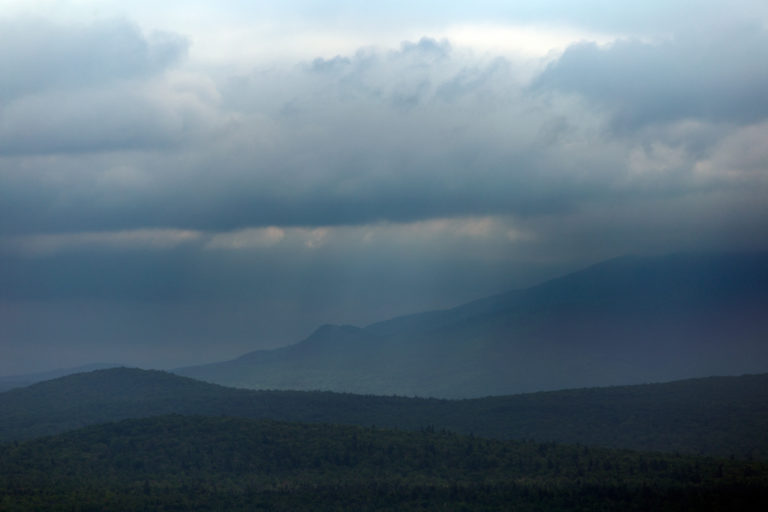 Storm Passing Over Hills