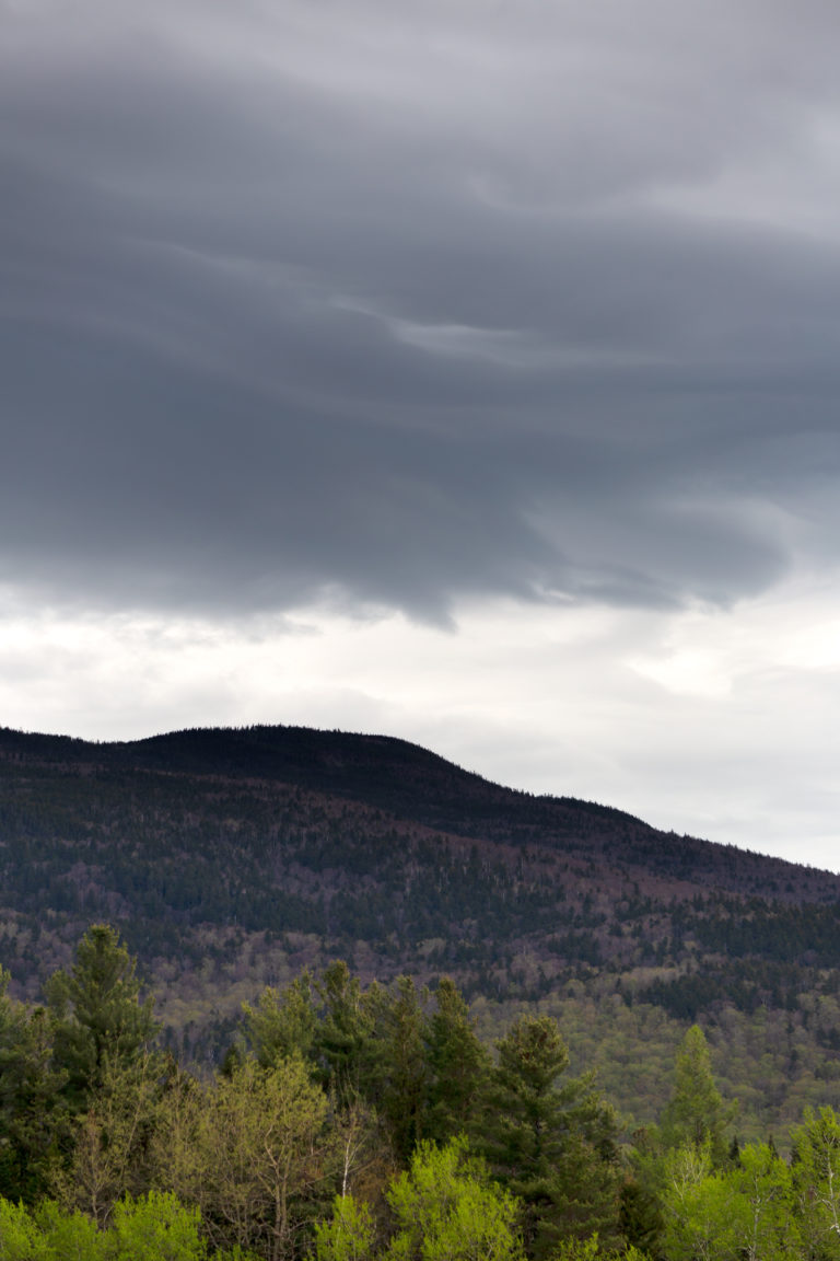 Grey Clouds Over Springtime Mountain