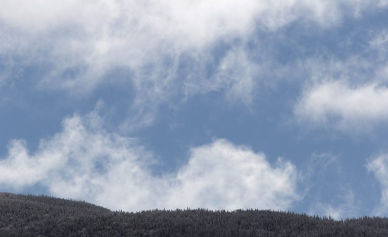 Light Clouds Over Landscape