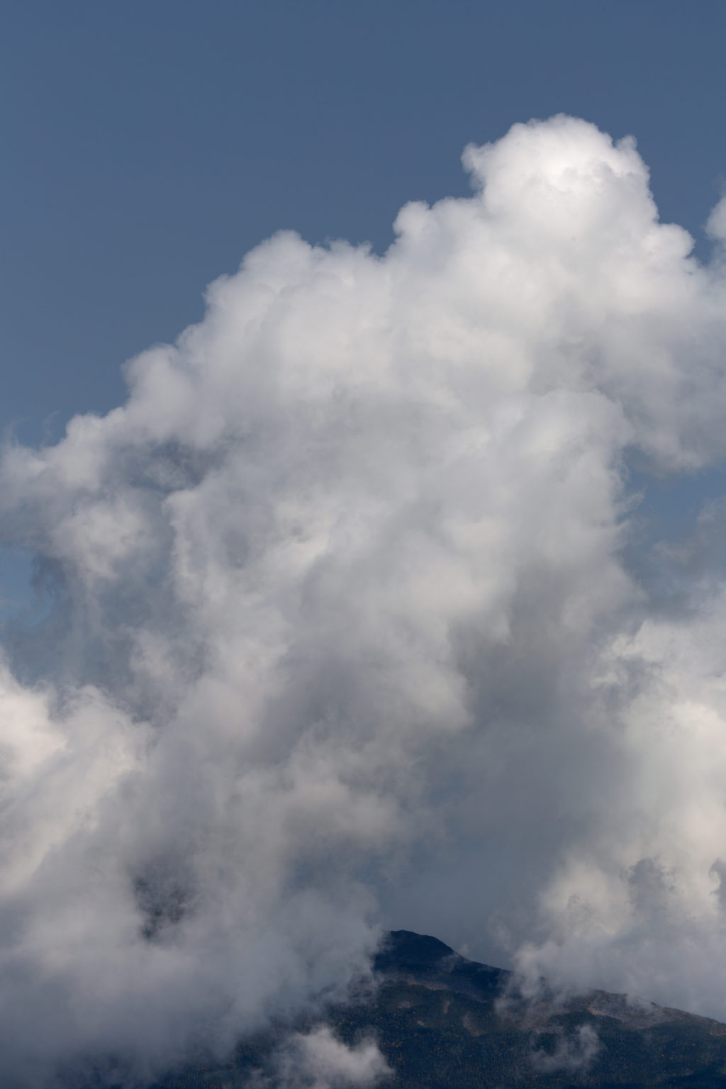 Mountaintop Banked in Clouds