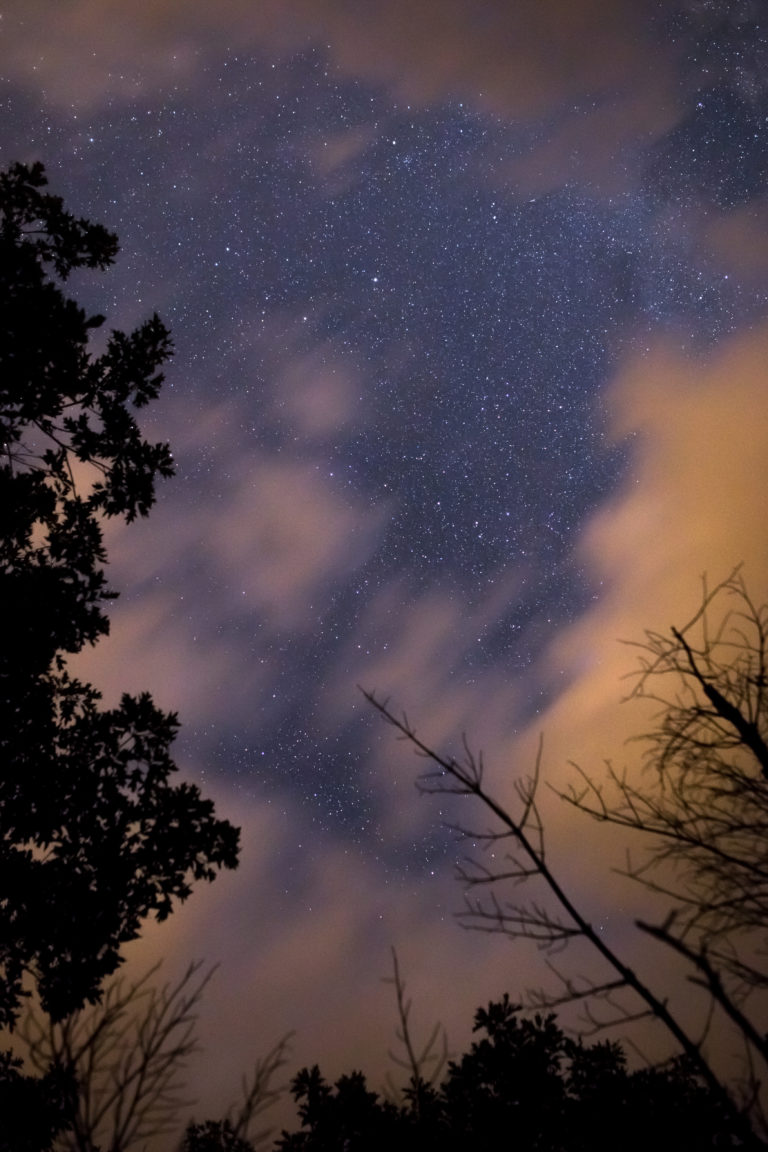 Blurry Clouds Moving Across Night Sky