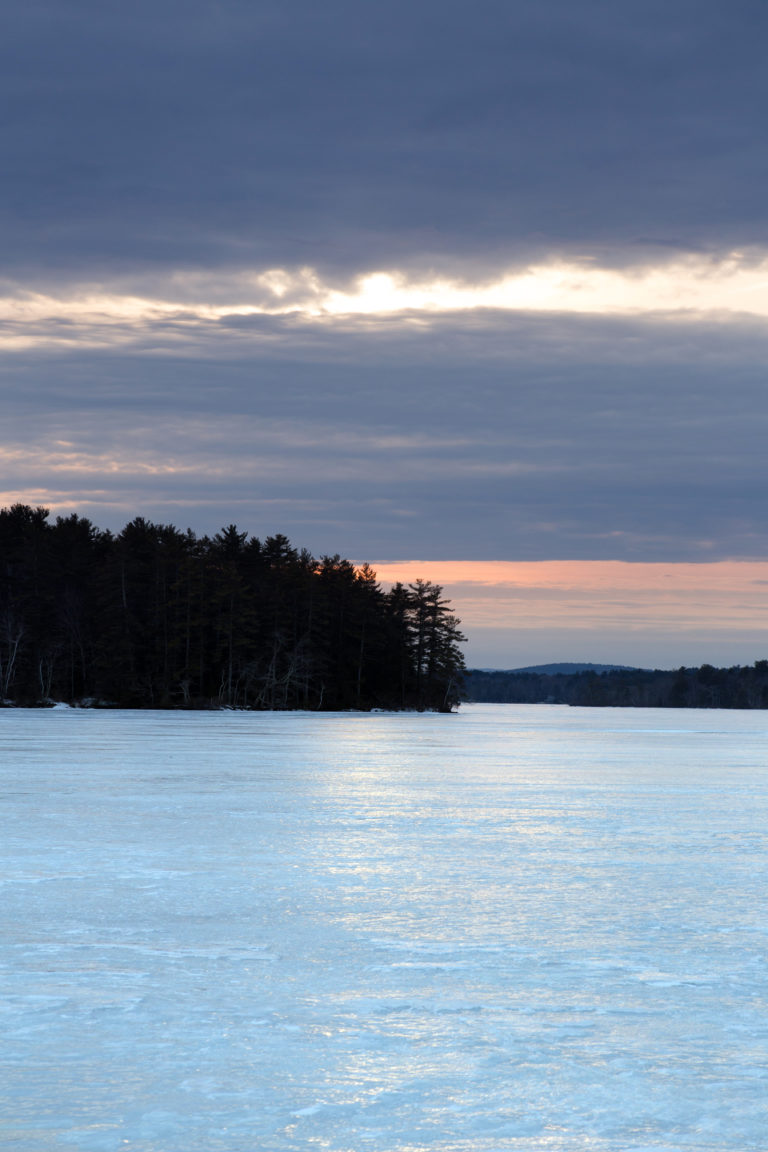 Frozen Lake with Land in View