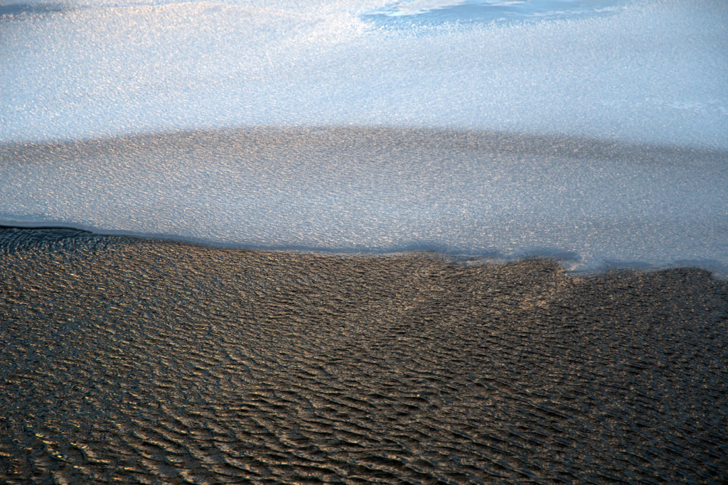 Delicate Water Ripples and Ice